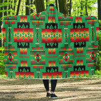 Green hooded blanket with multicolor Native American geometric pattern, front view