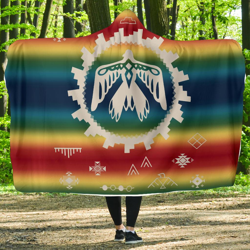 Multicolor Thunderbird hooded blanket with geometric motifs and central white emblem