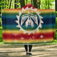 Multicolor Thunderbird hooded blanket with geometric motifs and central white emblem