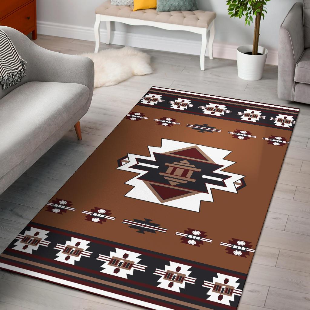 Rust-brown Native-style area rug with white starburst medallion and geometric border
