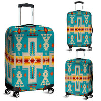 Teal luggage cover with colorful Native-style geometric cross and arrow patterns, zips at back