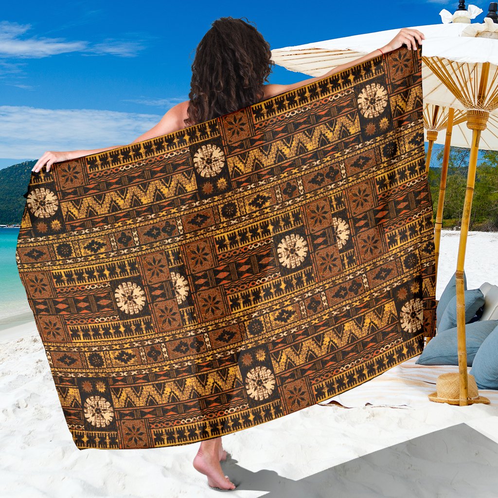 Brown Fiji-style masi tapa pattern sarong with bold geometric motifs