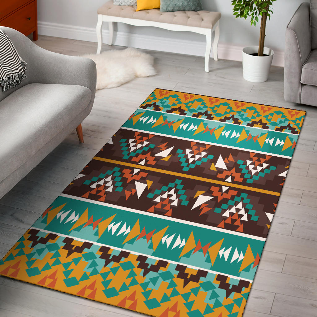 Colorful geometric area rug with teal, orange, brown, and white bands