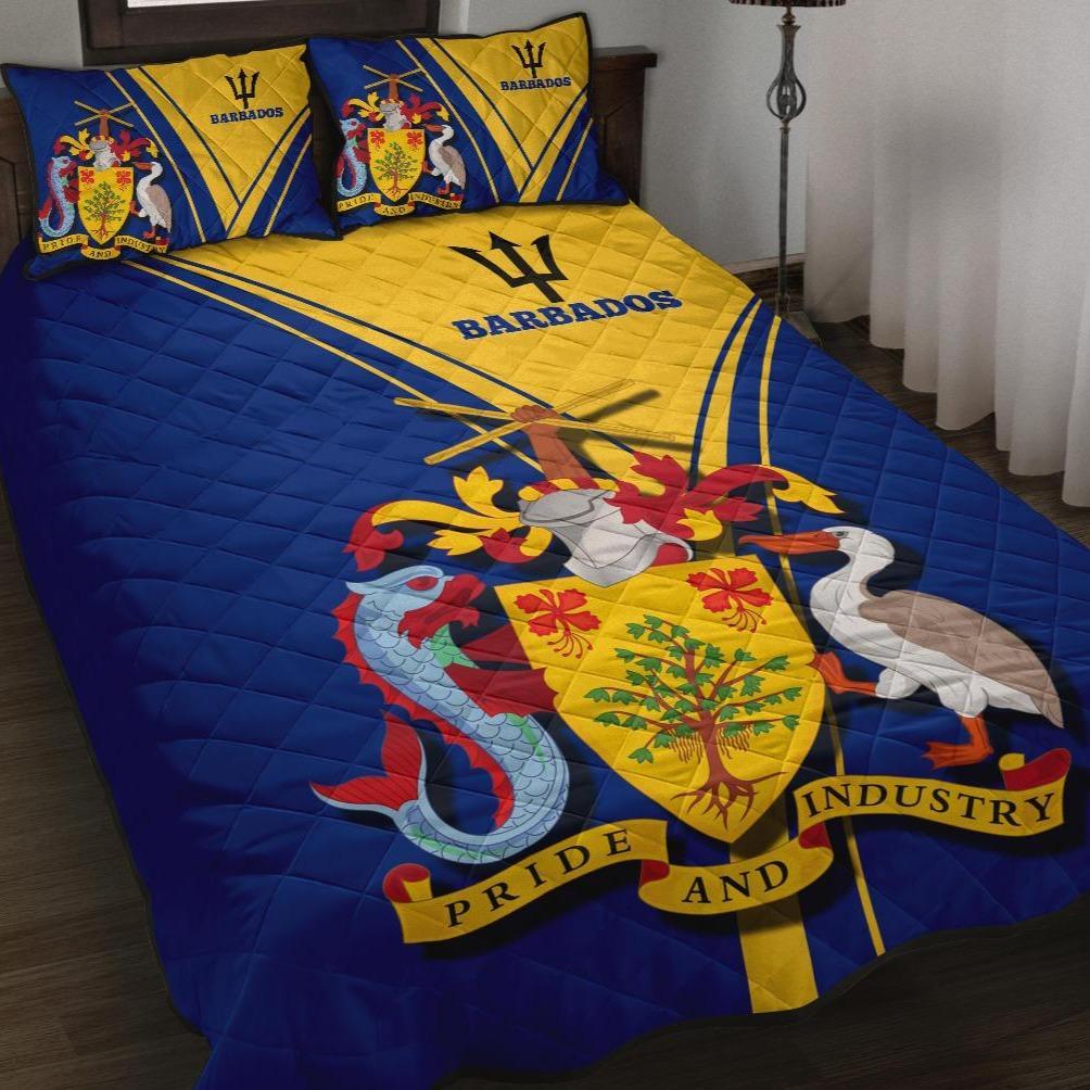 Blue and yellow Barbados quilt with coat of arms, 'Pride' and 'Industry' text; 2 pillows
