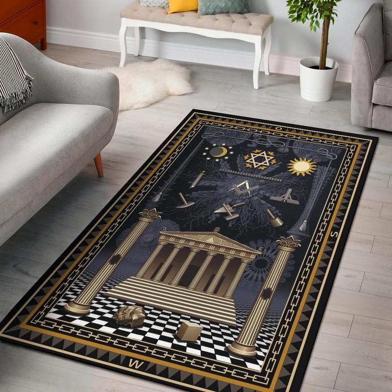 Black area rug with ornate gold-and-white Freemason style pattern and geometric border