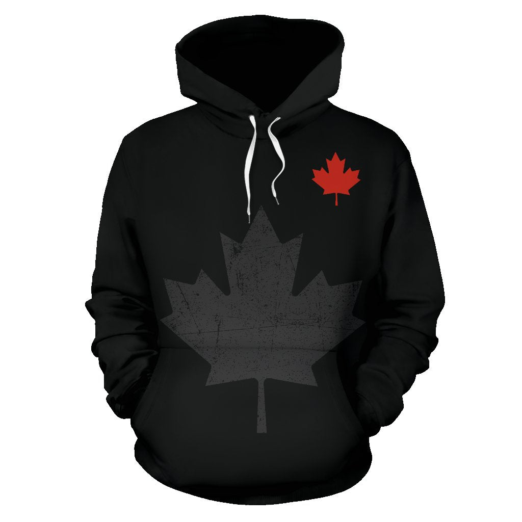 Black pullover hoodie with red maple leaf and gray leaf graphic on chest