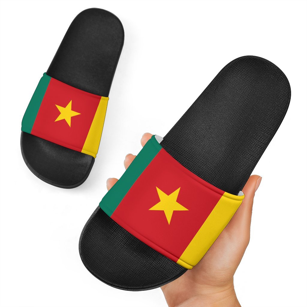 Cameroon slide sandals: black slides with red/yellow flag strap and gold star