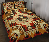 Yellow arrow Native American quilt bed set with red, black, and cream geometric patterns