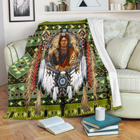 Green multicolor tribal chief blanket with geometric pattern and central portrait