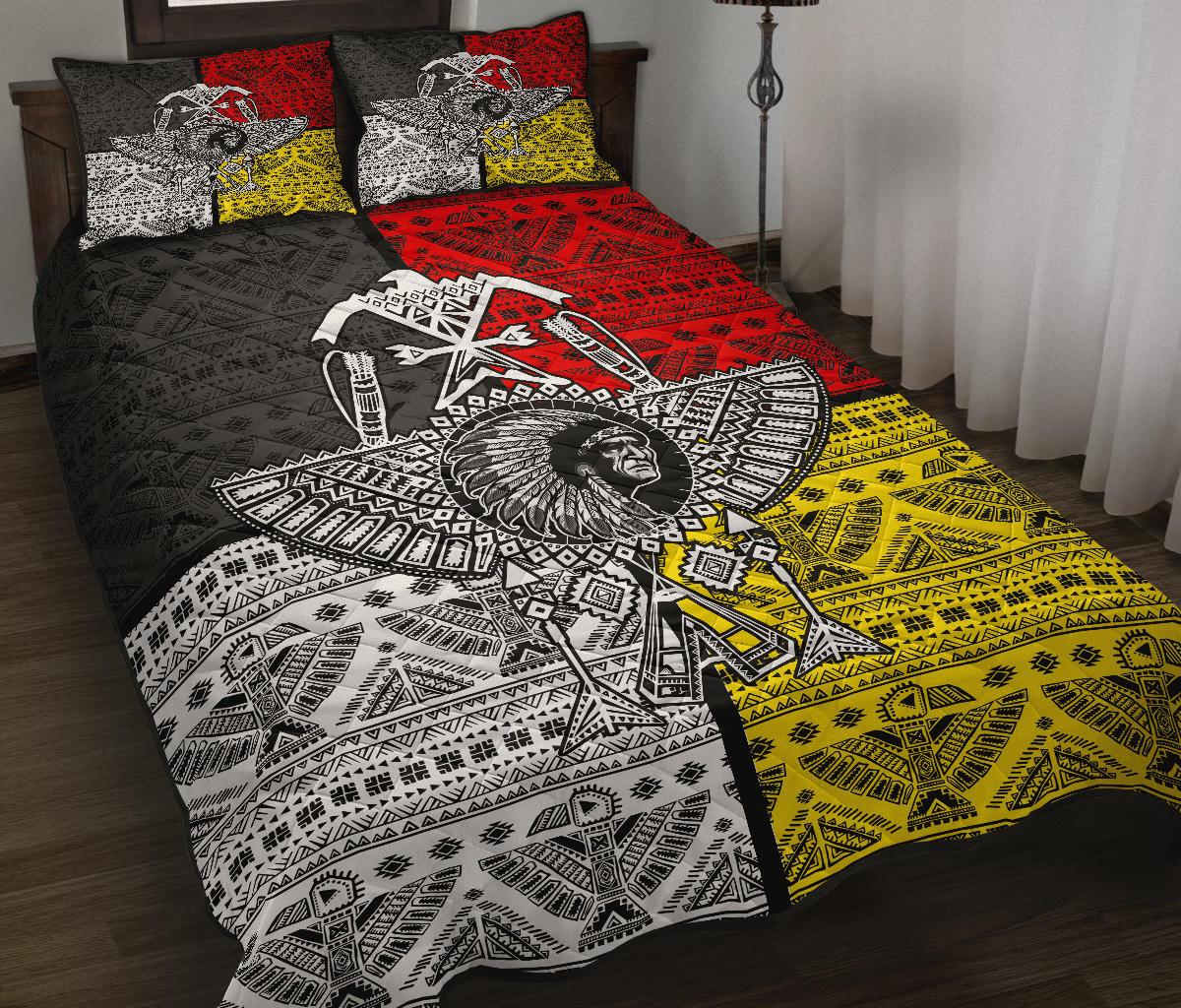 Colorful Native American quilt bed set with red, black, white, and yellow thunderbird prints