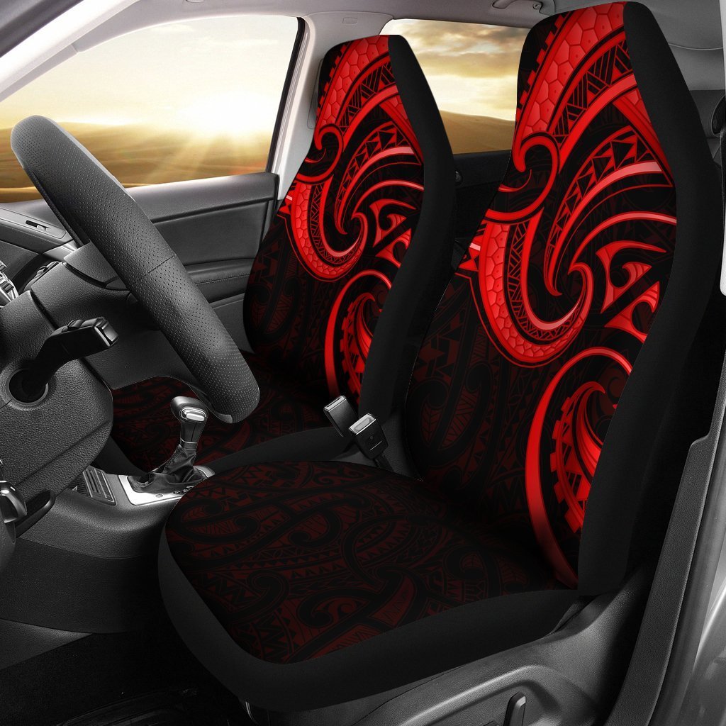 Red/black Polynesian seat covers with bold tribal wave motifs, front seats