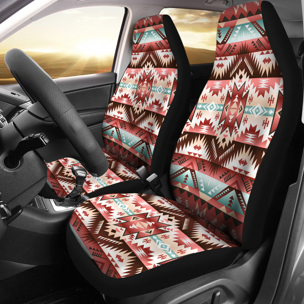 Red geometric patterned car seat covers with black edges, front seats installed