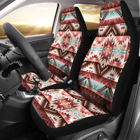 Red geometric patterned car seat covers with black edges, front seats installed