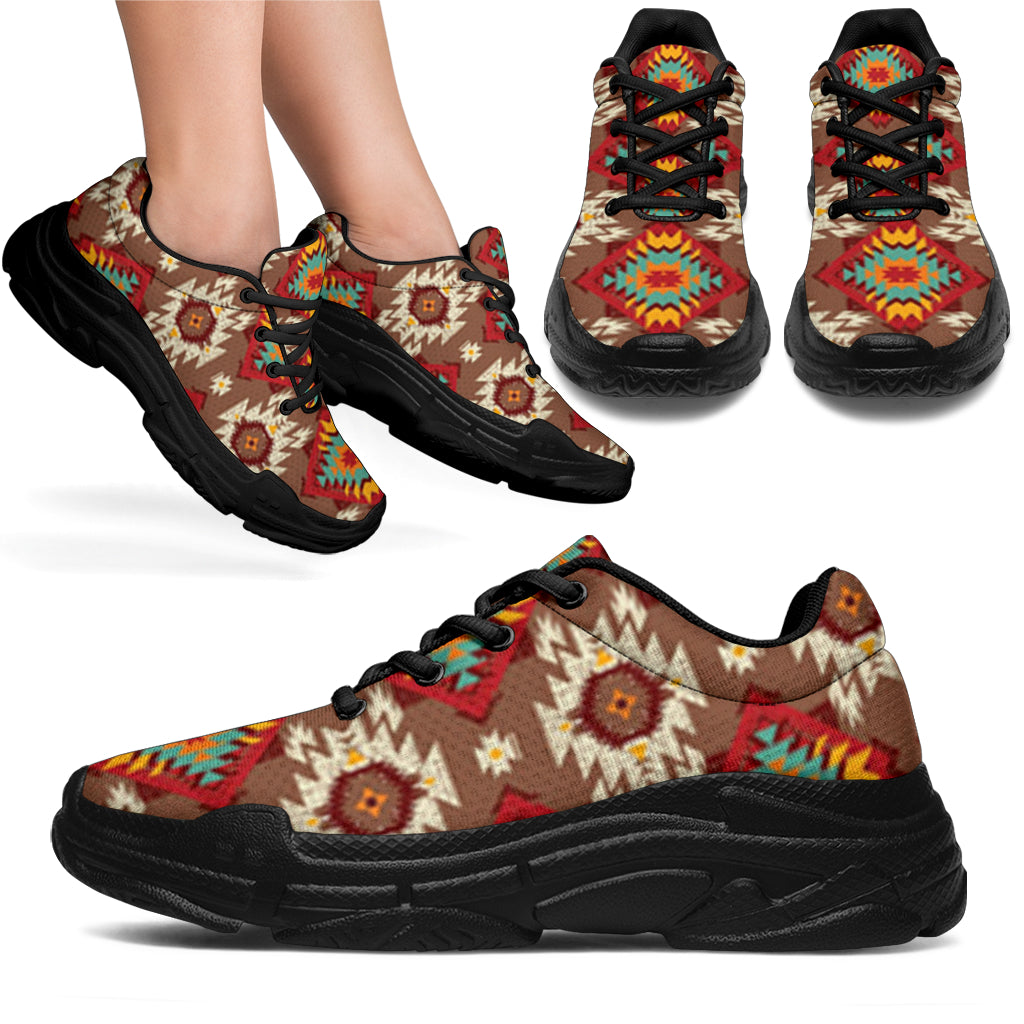 Native American style chunky sneakers, tan upper with red/green geometric print, black sole