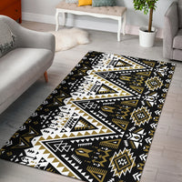 Black tribal area rug with geometric triangles and diamond medallions in white and gold