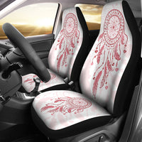 Car seat covers with pink dream catcher print on light base, black side panels