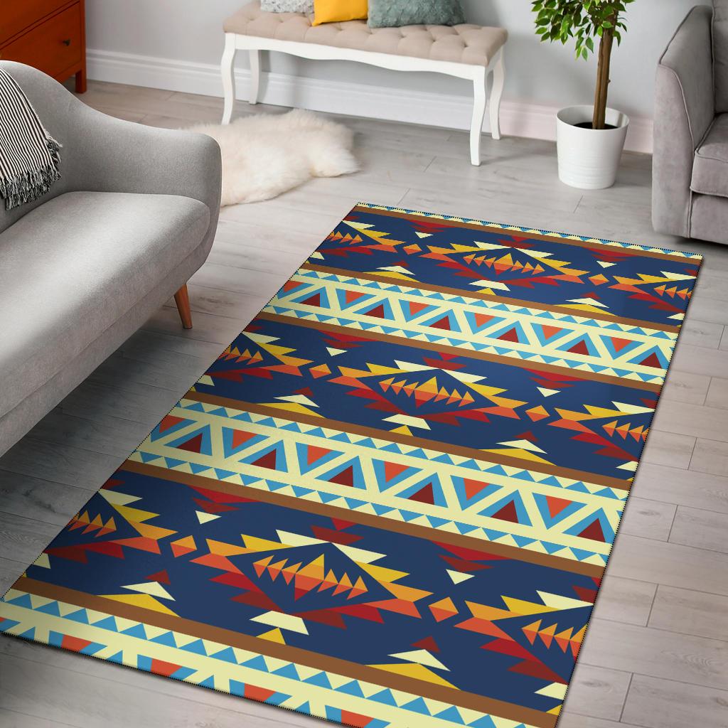 Blue Native American style area rug with geometric zigzags in orange, yellow, and light blue