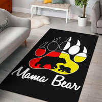 Black Mama Bear area rug with colorful paw prints and “Mama Bear” lettering