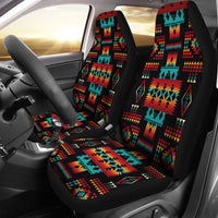 Front car seats with black seat covers featuring a multicolor Native geometric pattern