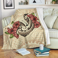 Beige Polynesian fish hook and hibiscus plumeria blanket with tribal pattern
