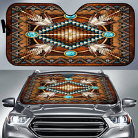 Brown auto sun shade with colorful Native American mandala beadwork design