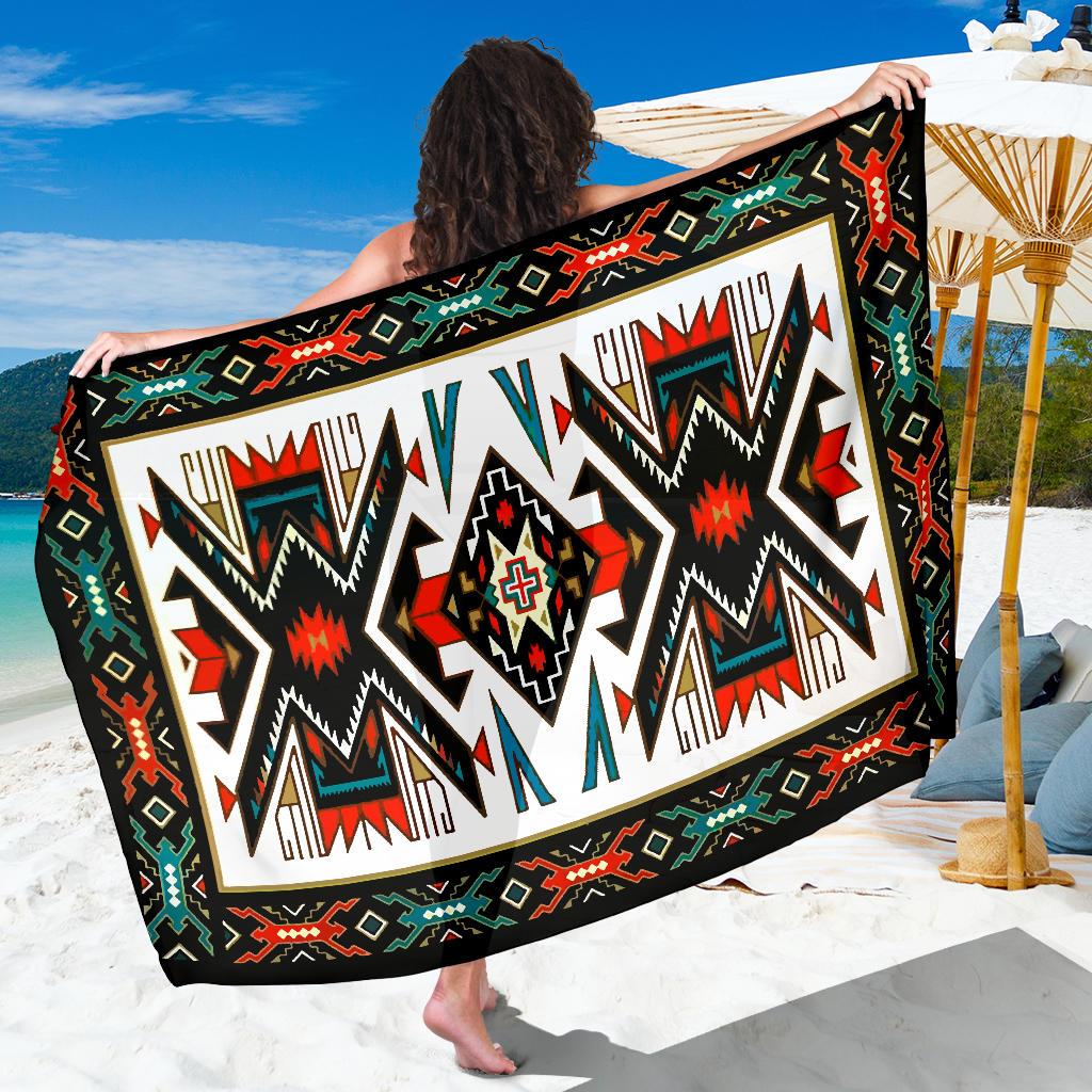 Colorful tribal sarong: black with geometric red, green, white zigzag and cross motifs