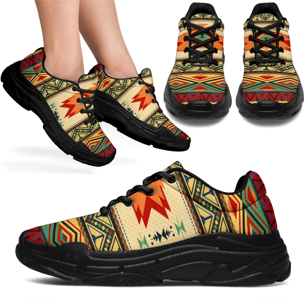 Native geometric chunky sneakers, beige upper with colorful pattern and black rubber sole, black laces