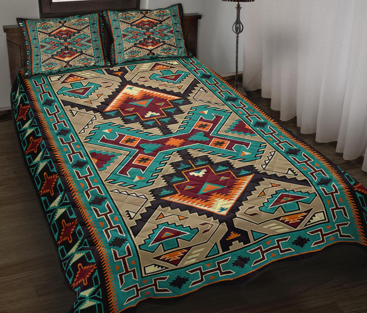 Quilt set with Native American style multicolor geometric patterns and border trim
