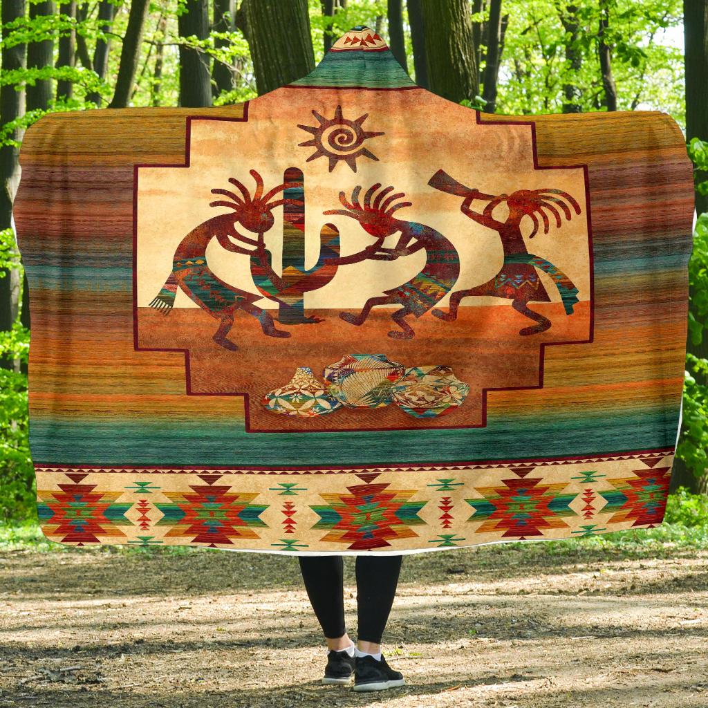 Multicolor hooded blanket with central Kokopelli and canyon-striped border; hooded design