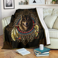Black throw blanket with centered wolf face in beaded necklace and gold dreamcatcher pattern