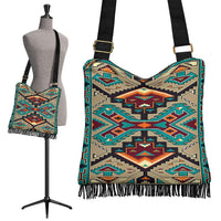 Colorful Native-inspired crossbody bag with turquoise, teal, tan pattern and fringe
