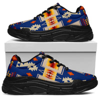 Blue lace-up chunky sneakers with native geometric print and black sole on box.