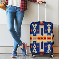 Dark navy luggage cover with multicolor native geometric pattern, suitcase on wheels