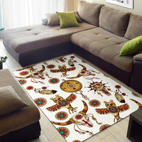 Native American style animal motif area rug with owl and bison on white