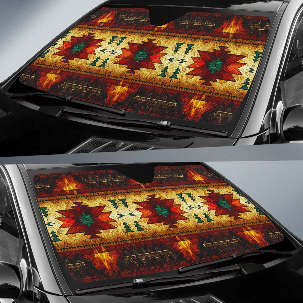 Colorful auto sun shade covering windshield with geometric Native-style motifs