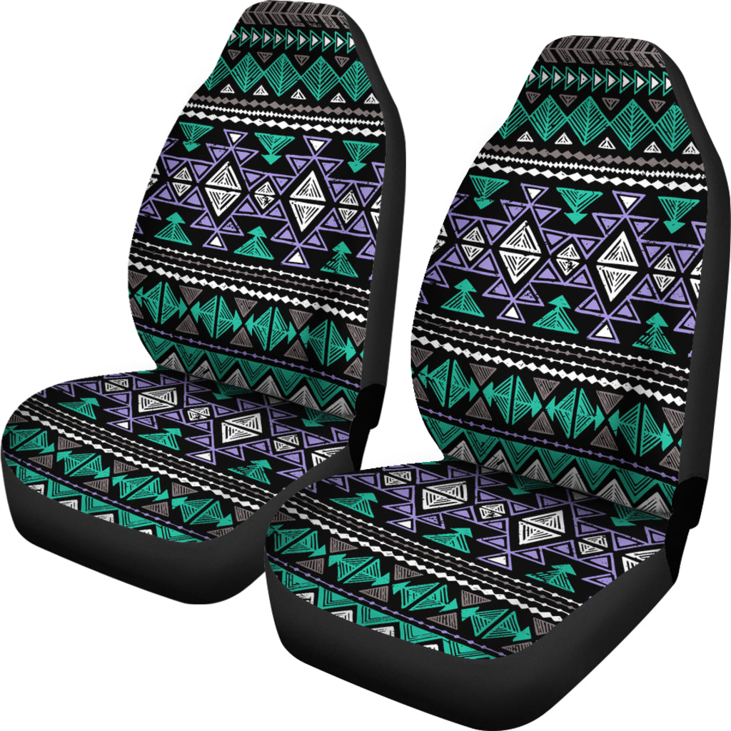 Pair of neon tribal car seat covers with teal and purple geometric pattern on dark base