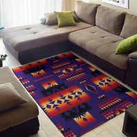 Purple geometric area rug with red and gold shapes on navy blocks