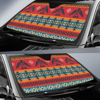 Car windshield sun shade with bold red, blue, and orange geometric tribal print