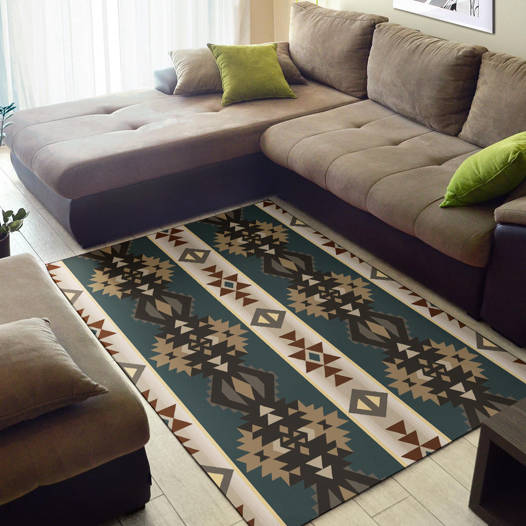 Runner-style geometric area rug on light floor, teal with beige, brown, and terracotta patterns