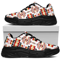 Tribes pattern chunky sneakers, side view: white/red/orange/black upper, black sole, lace-up