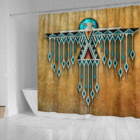 Full tan shower curtain featuring turquoise and white beaded Thunderbird design with drips