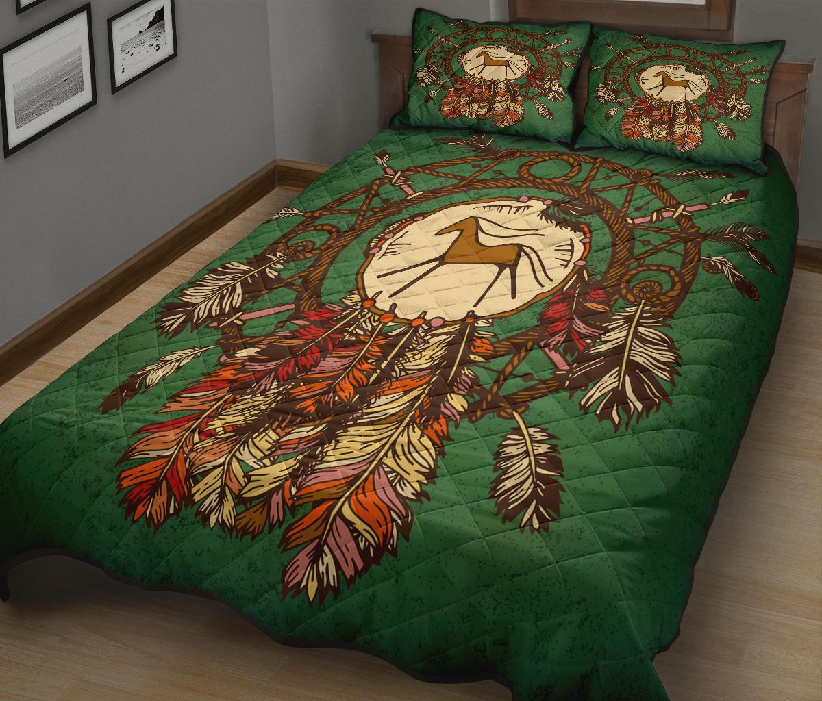 Green bedding set with centered horse dreamcatcher quilt and two matching pillows