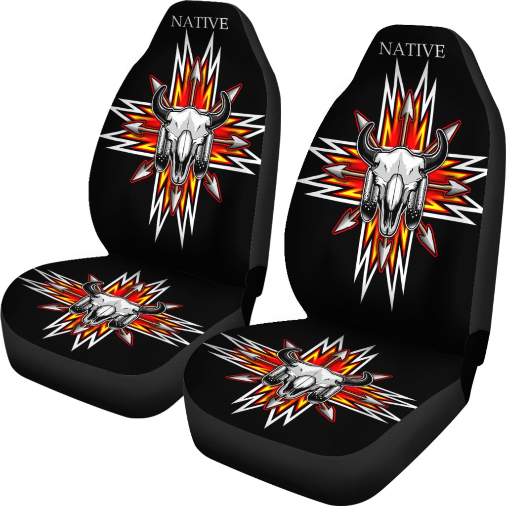 Pair of black car seat covers with bison skull and multicolor starburst designs