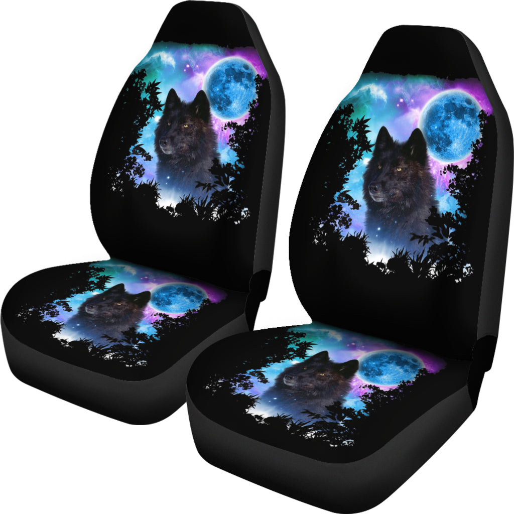 Set of car seat covers featuring wolf portrait with starry blue moon over trees