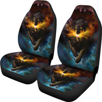 Two front seat covers with galaxy wolf graphic, multicolor starry blue and amber glow