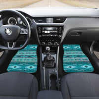 Pair of teal Native-style car mats on front floor, aztec stripes with red and white details