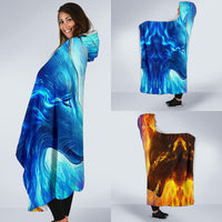 Hooded wolf blanket draped with blue side facing outward and orange side at back