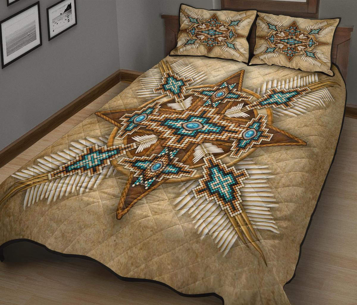 Quilt with central star motif in turquoise, beige backing, matching throw pillows