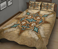 Quilt with central star motif in turquoise, beige backing, matching throw pillows
