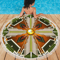 Green, brown, and white mandala beach blanket with center gold circle and fringe